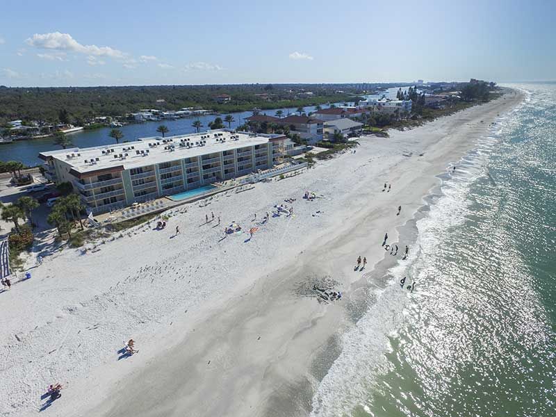 Aerial view of the beach in front of 50 Gulfside Condos